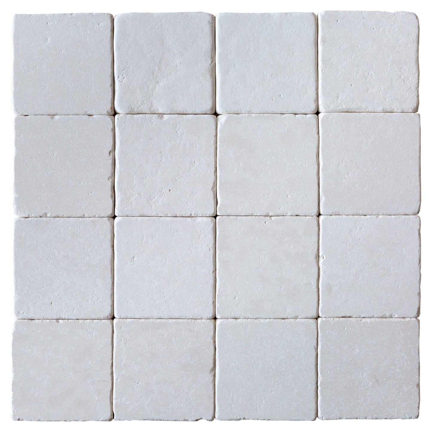 20012445 Champagne pearl tumbled limestone tiles 4x4 top view product shot