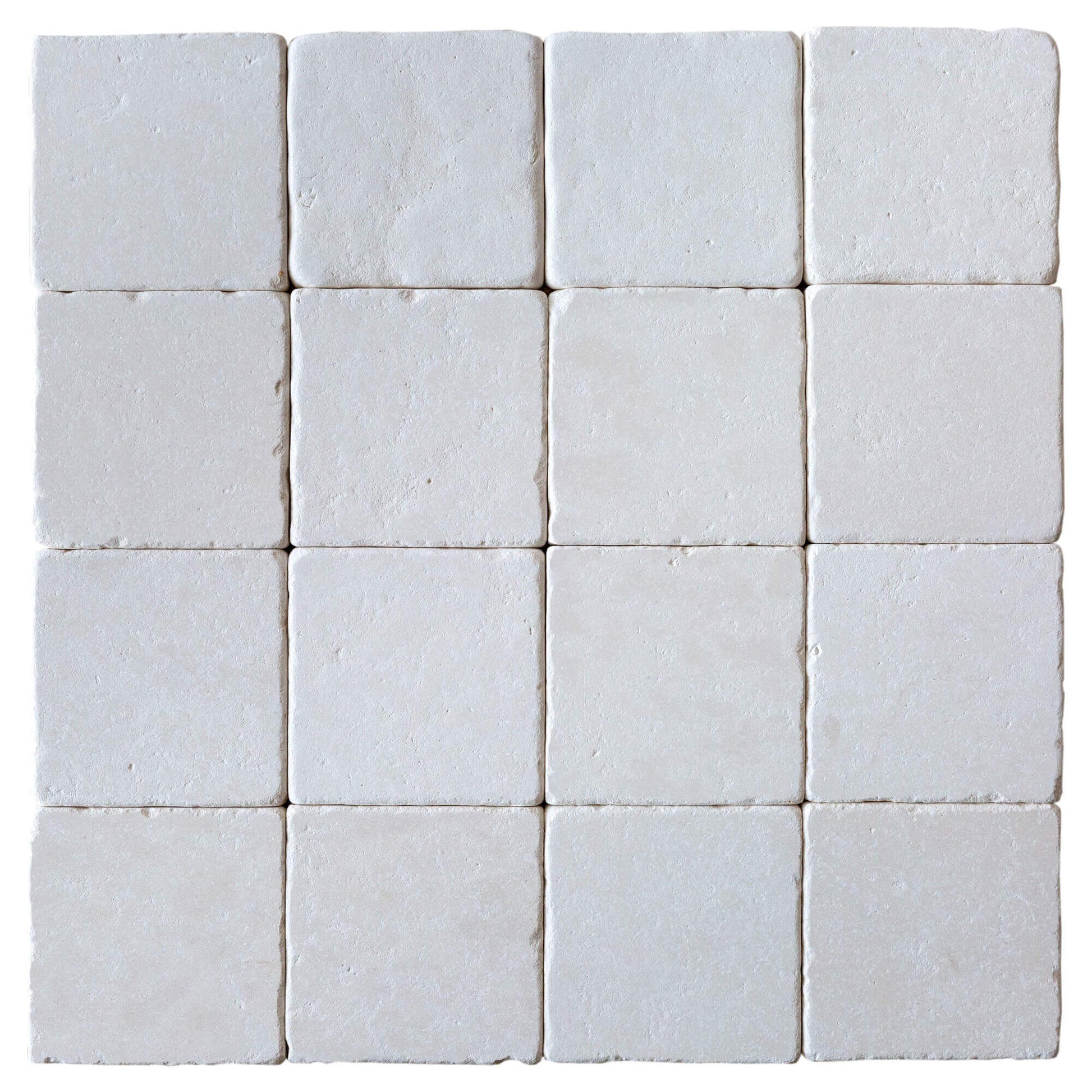 20012445 Champagne pearl tumbled limestone tiles 4x4 top view product shot
