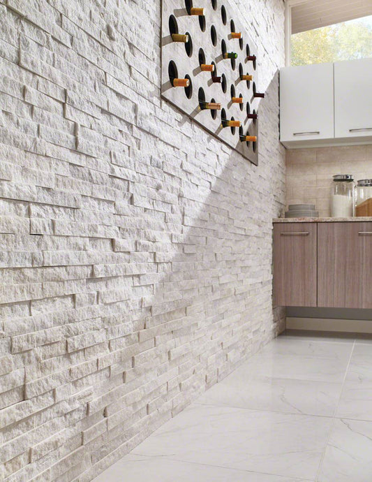 Arctic white splitface ledger panel 6X24 natural marble wall tile LPNLQARCWHI624 product shot top tiles view