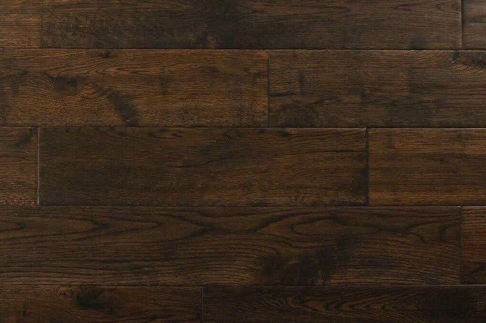 "Image of Oak Handscraped/Distressed Solid Hardwood Flooring in Blackmoon Oak. Each plank measures 3/4 x 4.75 inches. SKU: TRPSH-OBO."