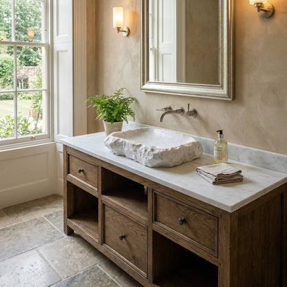 Bathroom vanity with marble countertop, wooden cabinets, and a large mirror. Carrara Marble Rustic Natural Stone Vessel Sink Polished Interior Hand Chiseled Exterior (W)16" (L)22" (H)5"
