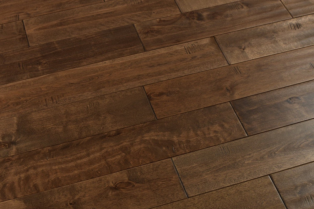 "Explore timeless beauty with Maple Distressed/Handscraped Solid Hardwood Flooring, 3/4 x 5 inches, in Century finish. Elevate your space with its rich texture and lasting charm. SKU: TRPSH-MPCT."