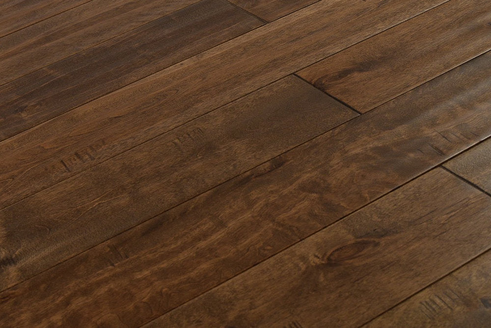 "Explore timeless beauty with Maple Distressed/Handscraped Solid Hardwood Flooring, 3/4 x 5 inches, in Century finish. Elevate your space with its rich texture and lasting charm. SKU: TRPSH-MPCT."