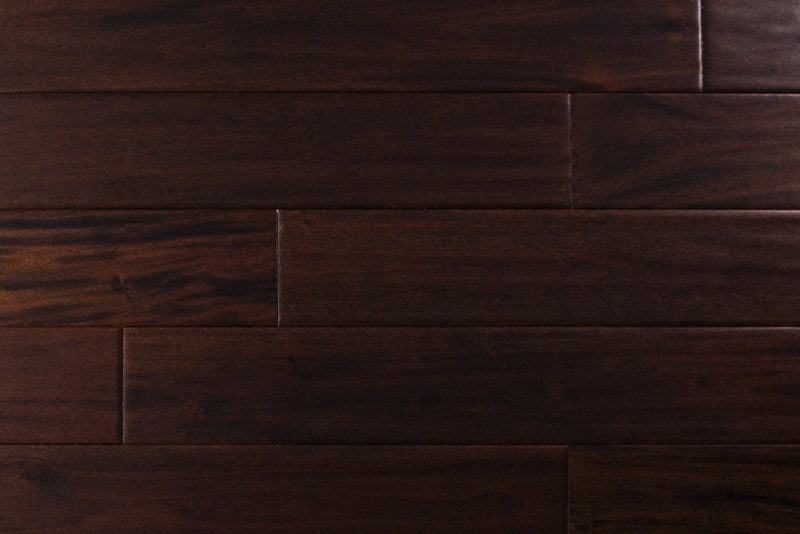 "Indo Mahogany Distressed/Handscraped Solid Hardwood Flooring in a Dark Ebony finish, 3/4 x 5 inches. SKU: TRPSH-IMDE. Revel in the luxurious depth and character of this exquisite flooring choice, adding elegance to any space."