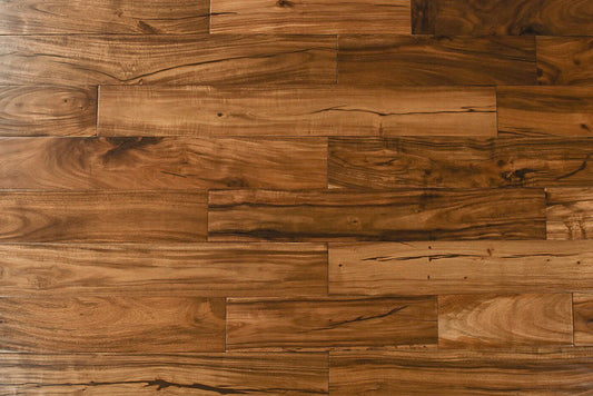 "Explore the allure of Exotic Walnut Natural Solid Hardwood Flooring in the Golden style. Luxurious handscraped finish, 4.75" width, and 0.75" thickness. SKU: TRPSH-EWG."