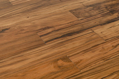 "Explore the allure of Exotic Walnut Natural Solid Hardwood Flooring in the Golden style. Luxurious handscraped finish, 4.75" width, and 0.75" thickness. SKU: TRPSH-EWG."