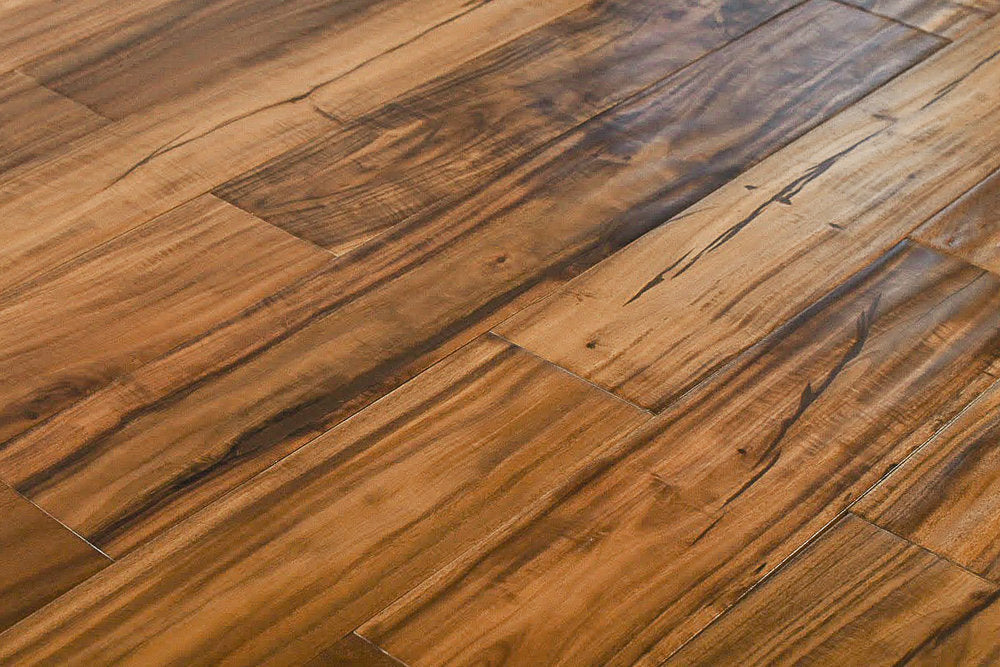 "Explore the allure of Exotic Walnut Natural Solid Hardwood Flooring in the Golden style. Luxurious handscraped finish, 4.75" width, and 0.75" thickness. SKU: TRPSH-EWG."