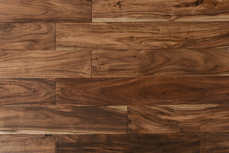 "Capture the essence of natural beauty with Exotic Walnut Natural Solid Hardwood Flooring, available in 3.6" and 4.75" widths and 0.75" thickness. Choose between Smooth or Handscraped finishes. SKU: TRPSH-EWNH, TRPSH-EWNS4.75, TRPSH-EWNS3.6."