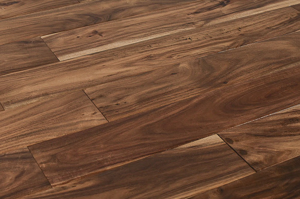 "Capture the essence of natural beauty with Exotic Walnut Natural Solid Hardwood Flooring, available in 3.6" and 4.75" widths and 0.75" thickness. Choose between Smooth or Handscraped finishes. SKU: TRPSH-EWNH, TRPSH-EWNS4.75, TRPSH-EWNS3.6."