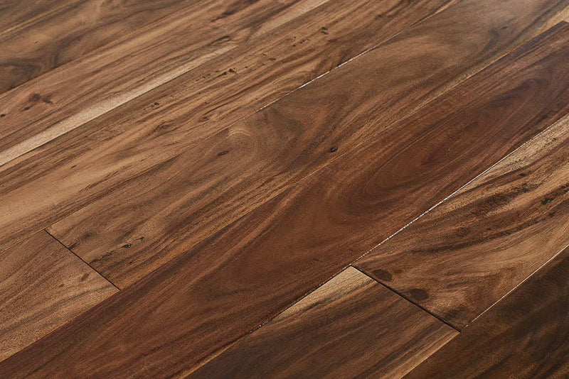 "Capture the essence of natural beauty with Exotic Walnut Natural Solid Hardwood Flooring, available in 3.6" and 4.75" widths and 0.75" thickness. Choose between Smooth or Handscraped finishes. SKU: TRPSH-EWNH, TRPSH-EWNS4.75, TRPSH-EWNS3.6."