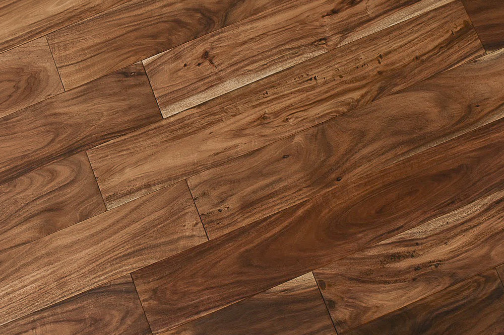 "Capture the essence of natural beauty with Exotic Walnut Natural Solid Hardwood Flooring, available in 3.6" and 4.75" widths and 0.75" thickness. Choose between Smooth or Handscraped finishes. SKU: TRPSH-EWNH, TRPSH-EWNS4.75, TRPSH-EWNS3.6."