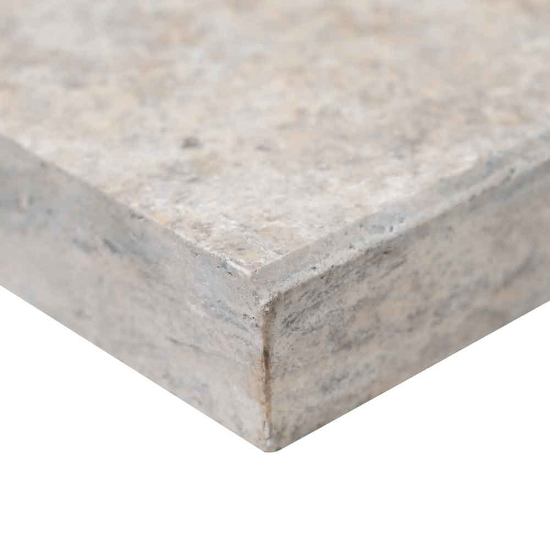 MSI-Silver-Travertine-Pool-Coping-16x24-Eased-Edge-LCOPTSIL1624HUFBR-EE-edge-close-up