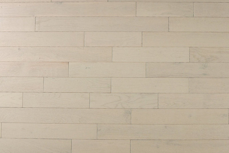 "Image of Oak Wirebrushed Solid Hardwood Flooring in Pebble. Each plank measures 5/8 x 3 inches. SKU: TRPSH-OP."