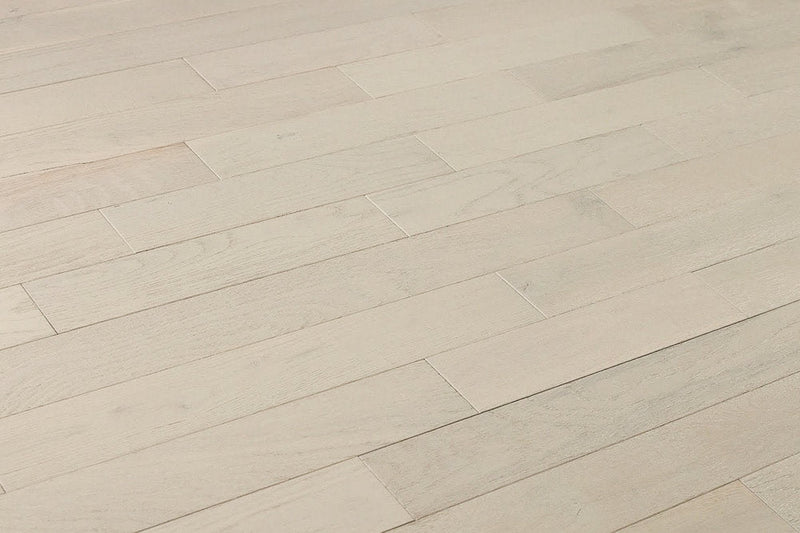 "Image of Oak Wirebrushed Solid Hardwood Flooring in Pebble. Each plank measures 5/8 x 3 inches. SKU: TRPSH-OP."