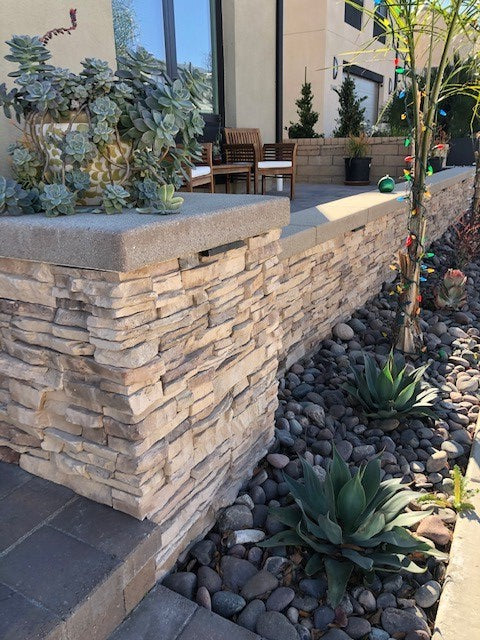 Peninsula sand stacked stone 9x195 natural manufactured stone LPNLEPENSAN6 product shot angle ledger view