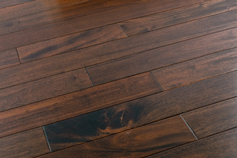 "Discover elegance with Indo Mahogany Smooth Solid Hardwood Flooring in the timeless Pitch Comodo style. Each plank, 3/4 x 3.6 inches, offers a sophisticated touch. SKU: TRPSH-IMPC. Elevate your space with this classic flooring choice."