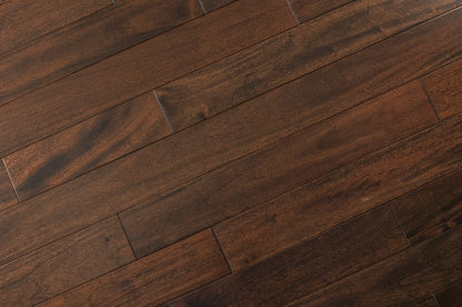 "Discover elegance with Indo Mahogany Smooth Solid Hardwood Flooring in the timeless Pitch Comodo style. Each plank, 3/4 x 3.6 inches, offers a sophisticated touch. SKU: TRPSH-IMPC. Elevate your space with this classic flooring choice."