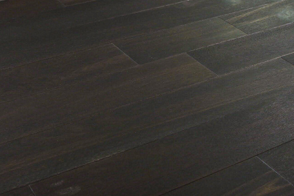 "Photo of Indo Acacia Wirebrushed Solid Hardwood Flooring in Simply Black. Each plank is 3/4 x 4.75 inches. SKU: TRPSH-IASB."