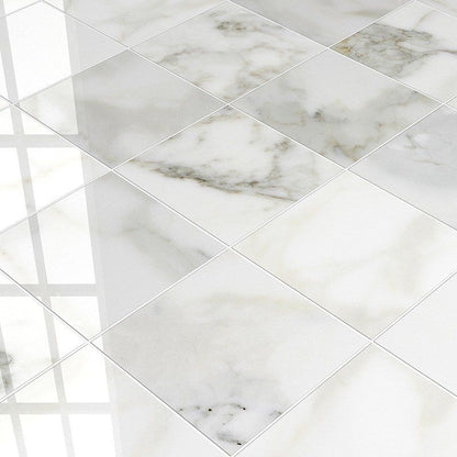 Calacatta Gold Honed Marble Tile