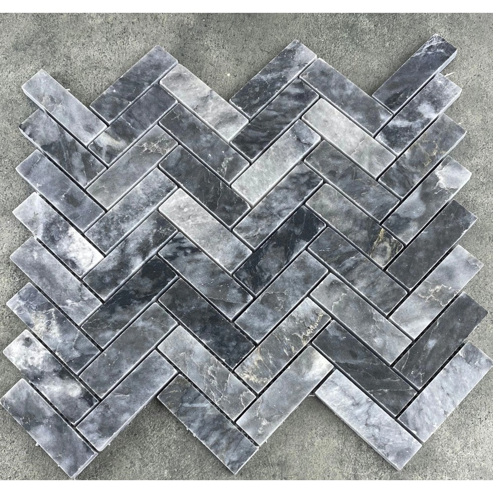 Luna sky marble 1x3 herringbone honed angle SKU-HSLS1x3HBMOSH Product view under sunlight