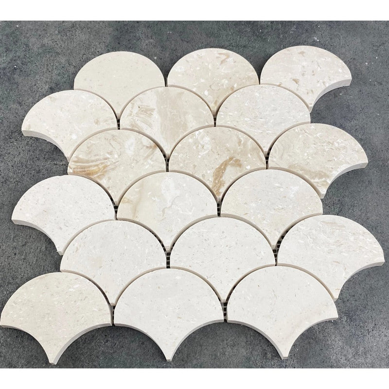 Shell Stone Limestone Laguna Design on 12" x 12" Mesh Mosaic Tile SKU-HSSSLAGDMOSH under sunlight