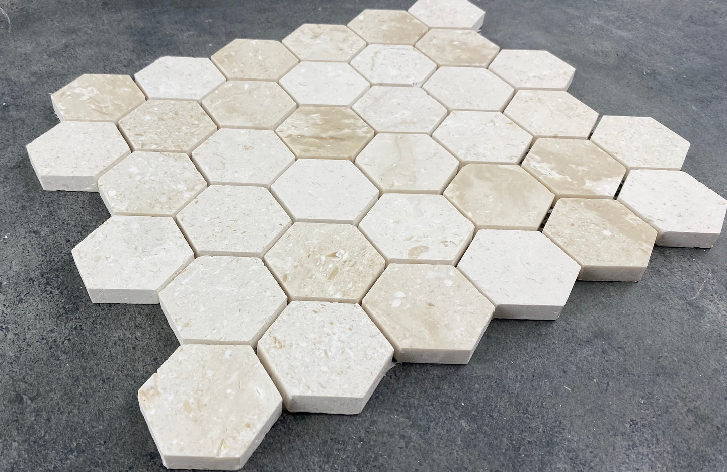 Shell Stone Limestone 2" Hexagon Honed on 12" x 12" Mesh Mosaic Tile