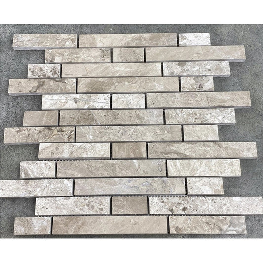 Silver Shadow Marble Liner on 12" x 12" Mesh Mosaic Tile SKU-HSHSSLNBMOSH under sunlight