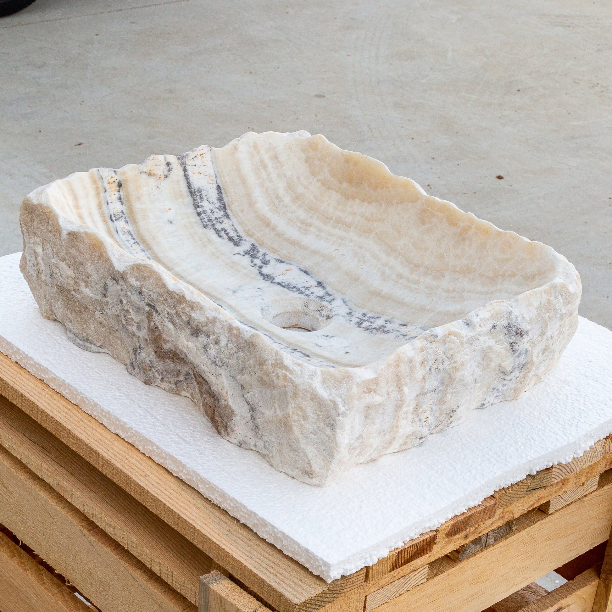 honey onyx rustic natural stone vessel sink SKU NTRSTC55 perpective view product shot