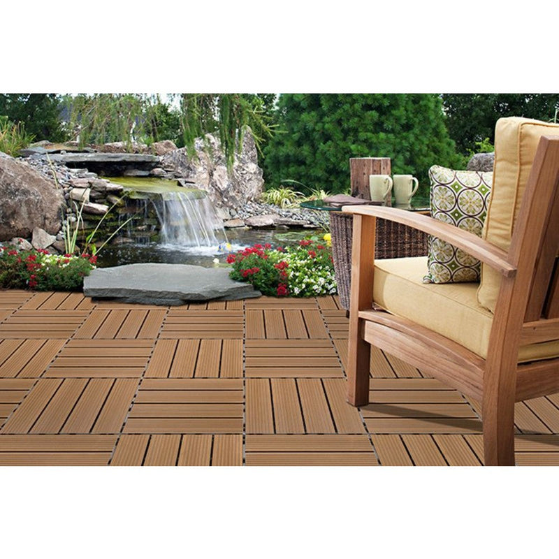pensa composite wood tile deck size 12"x12" installed on a patio near natural pool